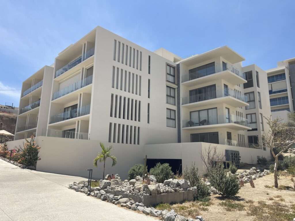Los Cabos Cabo Costa POOL INCLUDED! This stunning 2-bedroom condo with huge deck is located on the first level in the Balandra Tower of Cabo Costa . Cabo Costa is the newest community that blends its arquitectural designs with nature. This unit has been meticulously designed and comprises two end-suite bedrooms. The property interior is designed in neutral tones to create a modern, welcoming and luxurious home yet retaining its original features. Amenities such as a Club House, Infinity pool, Gym, sundeck, Kids area, Jacuzzi, Wetbar, Snackbar & Massage area. – Lote 49 Isla dorada vista real desarro, Cabo Corridor, BS