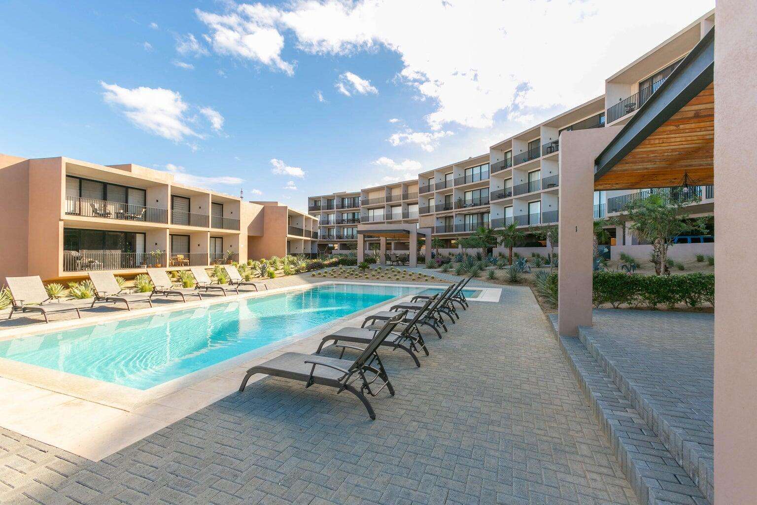 Los Cabos Cora Aqua Tower, located within Club Campestre San José del Cabo, one of Los Cabos' premier gated communities. Features 2 bedrooms, 2 full bathrooms, a guest half bath, TV room, laundry room, ocean for sale