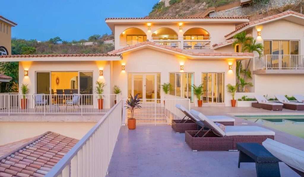Los Cabos Los Valles Sophisticated and solidly built, this 5,588 sq.ft. estate in Club Campestre offers luxury living with exceptional construction quality rarely found in Los Cabos. Residents enjoy exclusive access to a private beach club and world-class golf course, all just minutes from San Jose vibrant dining and culture. The home features 4 ensuite bedrooms, a 3-stop elevator, and a Generac backup system. Entertain in style with a chef's kitchen, wine room with Tzalam wood cabinetry, and an outdoor BBQ area with fire pit. Relax by the heated pool or on the Jacuzzi terrace with partial ocean – Cresta Del Mar, Cabo Corridor, BS