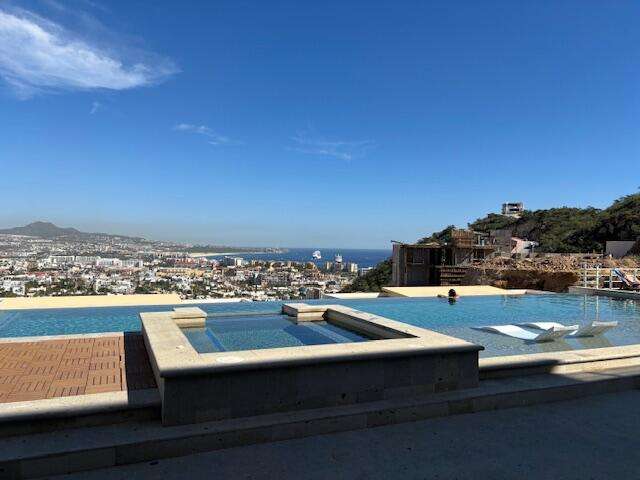 Los Cabos Pedregal Towers Pedregal Towers A03 is a rare 3BR/3BA condo in Cabo San Lucas exclusive Pedregal community, walkable to downtown and the marina. Floor-to-ceiling sliding doors connect the living area to a private terrace with city/mountain for sale