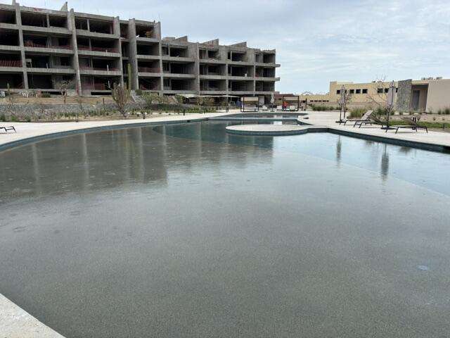 Los Cabos Lumaria Enjoy resort living within a private and gated community, Amenities include a resort style pool, large jacuzzi, state of the art gym, spa treatment rooms and a full-service cafe. This penthouse unit has a pergola for shade over your outdoor dining area, full counter area with a sink, propane hook up for outdoor grill, hook up for hot tub and perimeter lighting for nighttime use. Close to grocery store as well as Home Depot. Driving access to Costco without going on the highway. – Salomon De La Cruz Perez, Cabo Corridor, BS